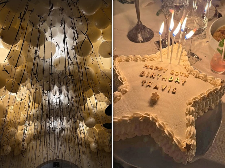 Long, moody outdoor table flickering with dozens of candles at the celebration.