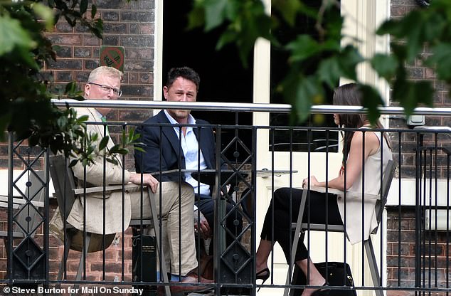 Meredith Maines meeting King Charles III's communications secretary, Tobyn Andreae, in Mayfair, London (July 2025)