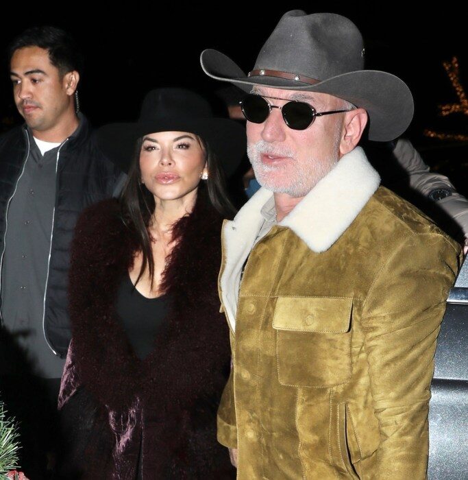 Lauren Sanchez and Jeff Bezos wearing matching cowboy hats outside Kemo Sabe in Aspen.