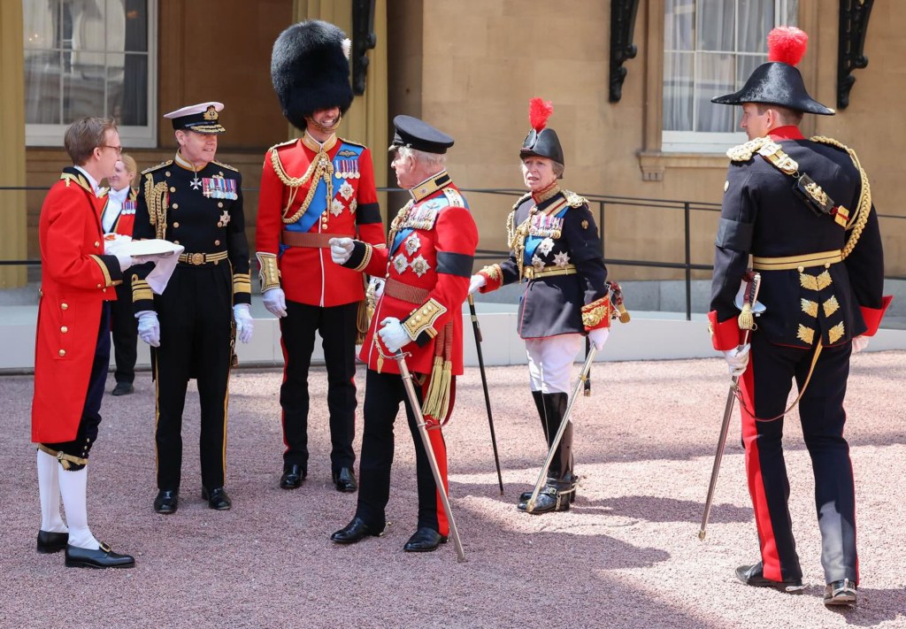Prince William, King Charles III, Princess Anne and others in military attire at Trooping the Colour.