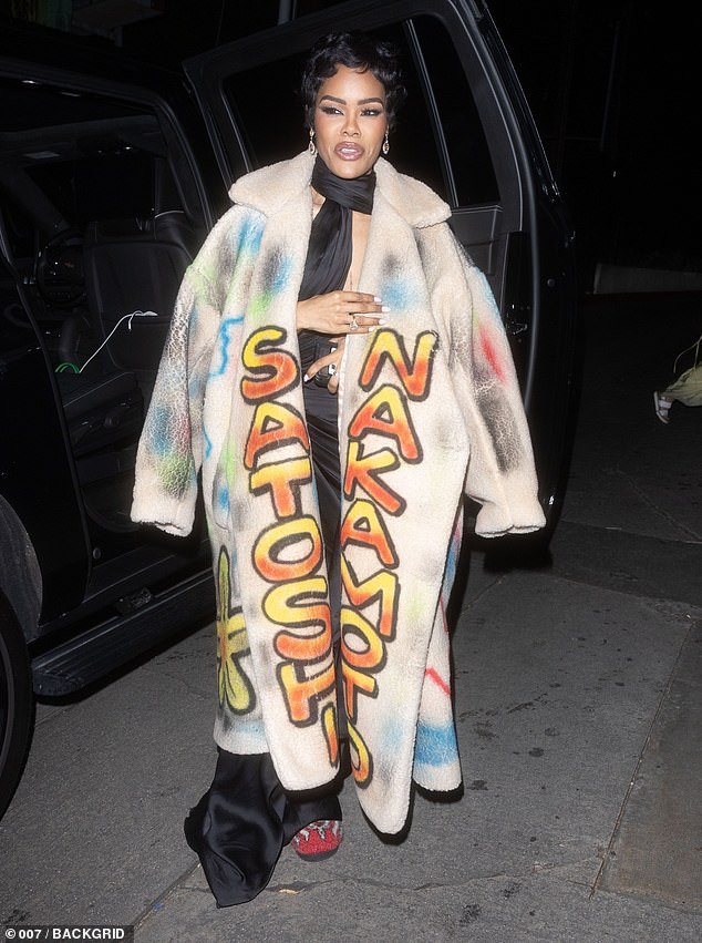 Teyana Taylor leaving Chateau Marmont in a graffiti-covered coat