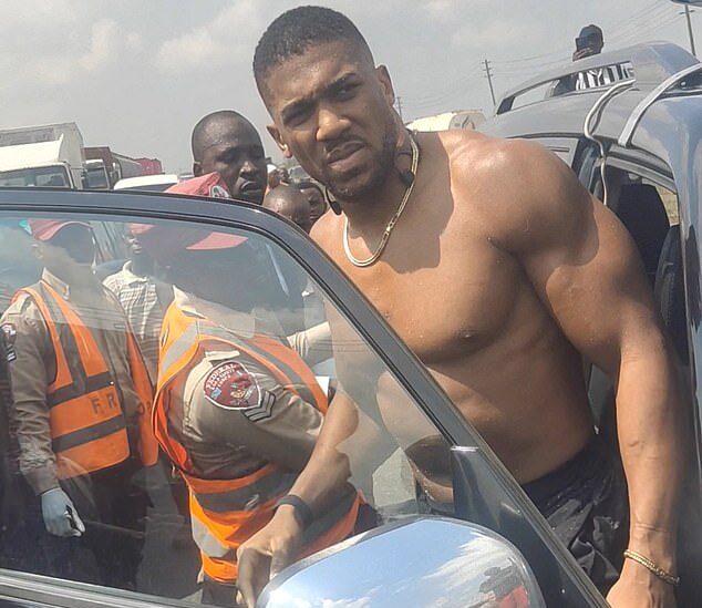 Anthony Joshua seen exiting the vehicle after the Lagos-Ibadan Expressway crash in Nigeria