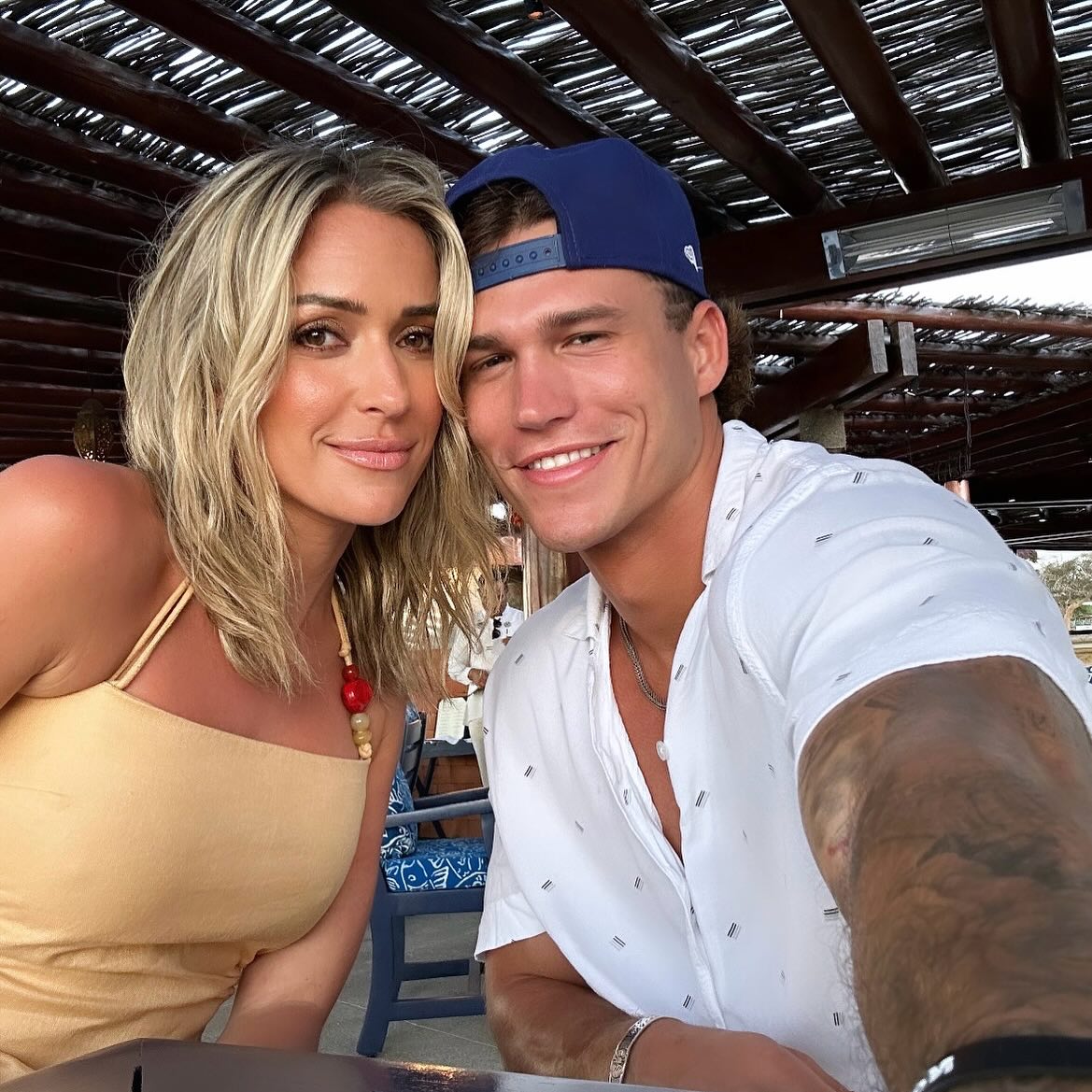 Kristin Cavallari and Mark Estes smile at the camera.