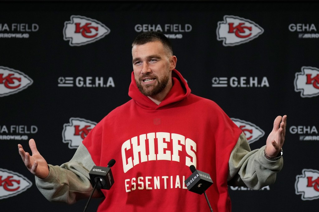 Travis Kelce walks off the field after a game in December 2025.