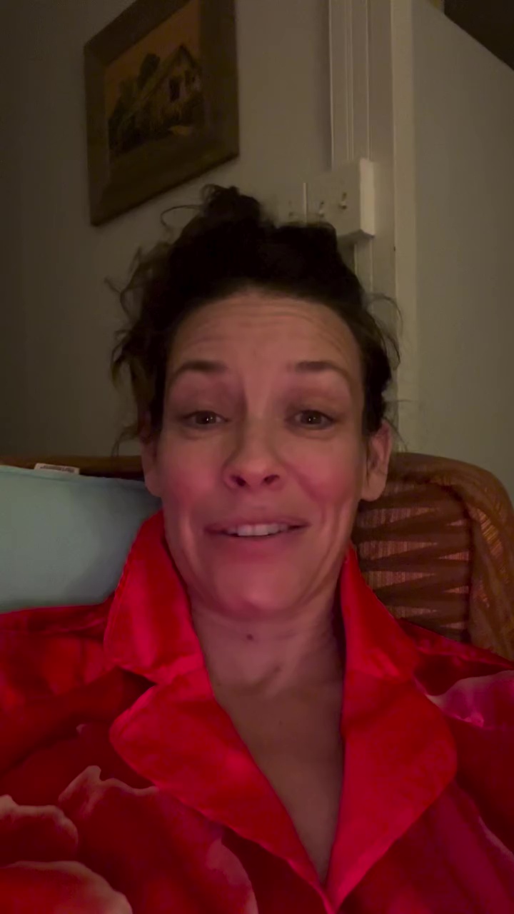 Evangeline Lilly smiling at the camera.
