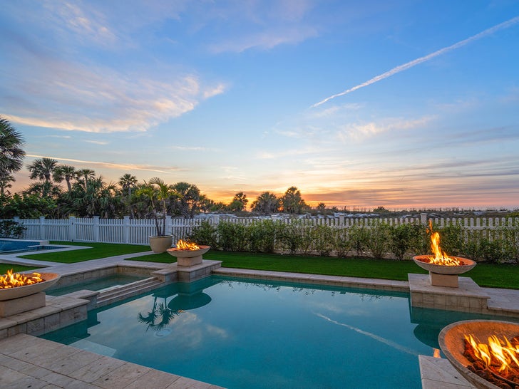 Heated pool, spa and covered outdoor living areas overlooking the Gulf at Hulk Hogan's former home.