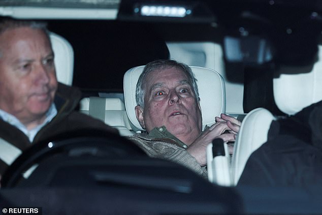 Andrew Mountbatten-Windsor in a car after being released from police custody on suspicion of misconduct in public office