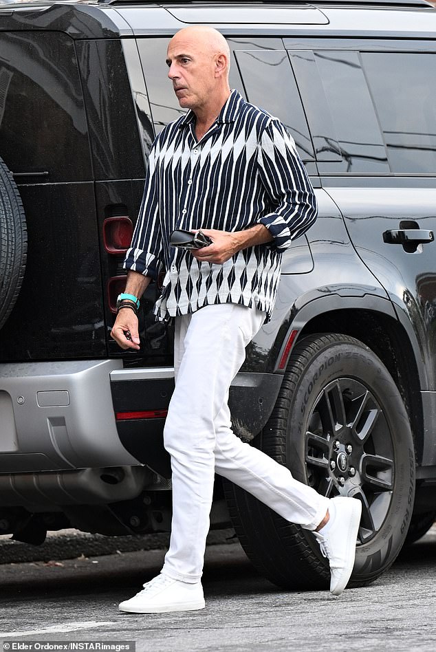 Matt Lauer walking outdoors