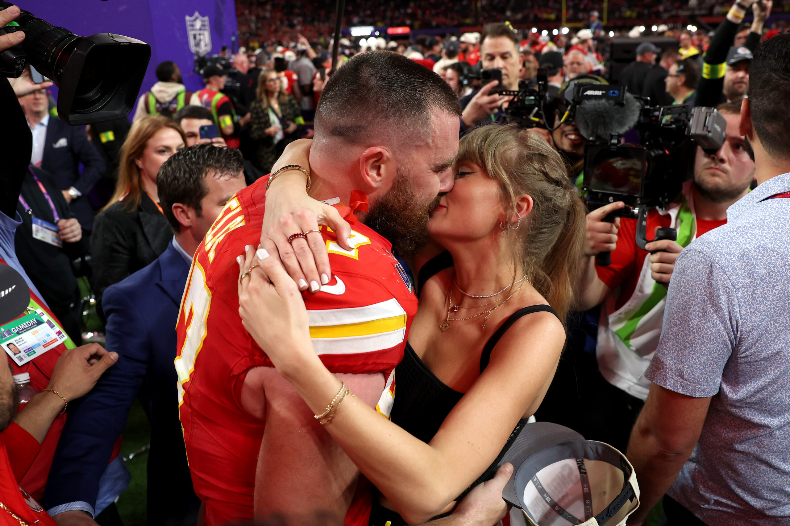 Travis Kelce steps into the DJ booth during the Tight Ends & Friends Super Bowl week party.