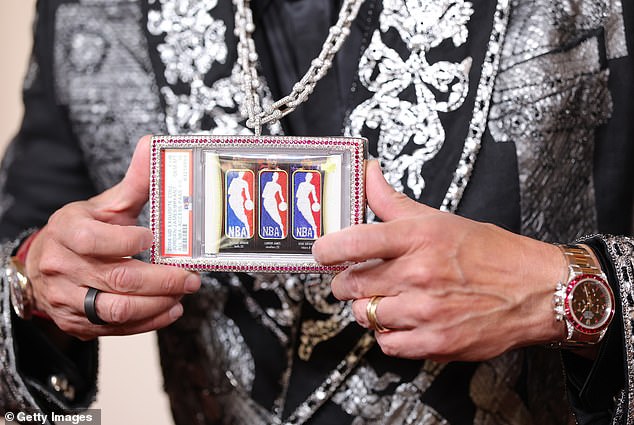 Close-up of the Tiffany & Co. diamond-and-ruby case holding the Jordan-Kobe-LeBron Triple Logoman card