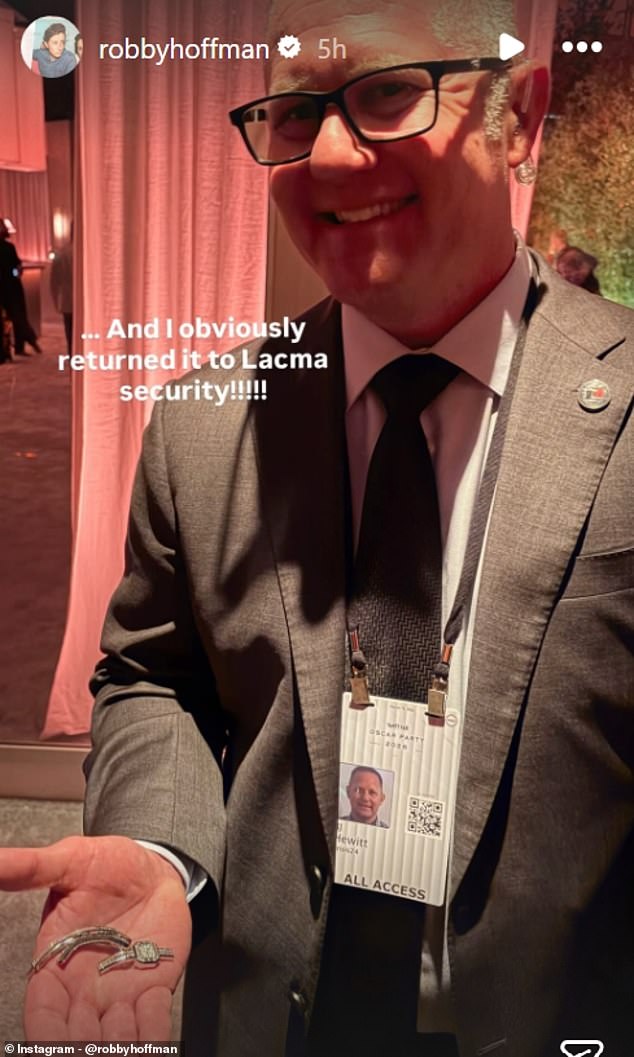 Robby Hoffman holding a diamond Boucheron watch in an Instagram Story at the Vanity Fair Oscars party