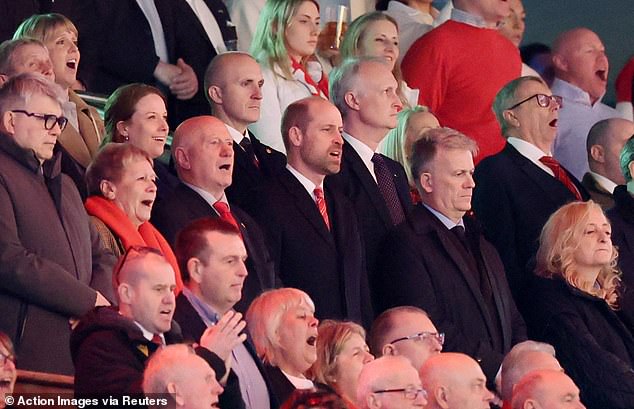 Prince William sings Hen Wlad Fy Nhadau with supporters at Cardiff's Principality Stadium before Wales vs Italy, March 14, 2026.