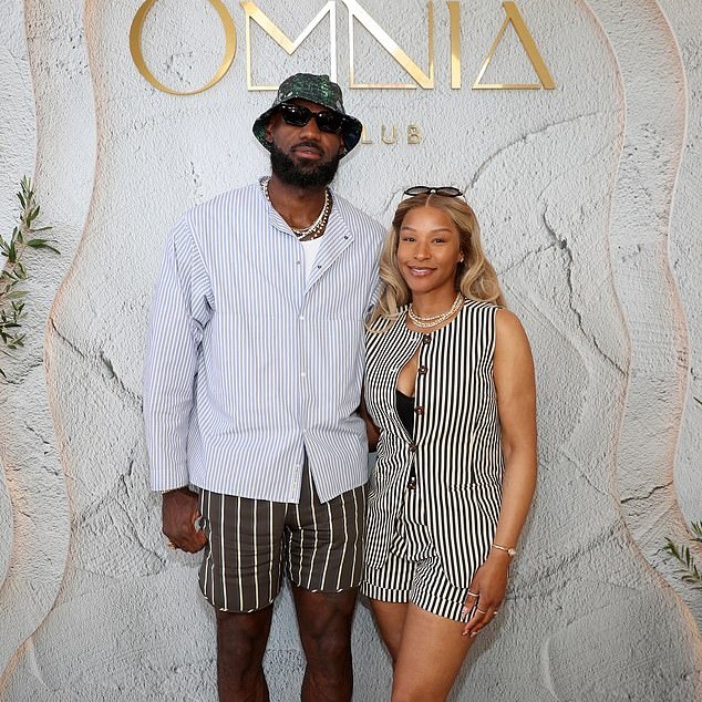 LeBron James poses for a photo with his wife Savannah at the Omnia Dayclub grand opening - Daily Mail US
