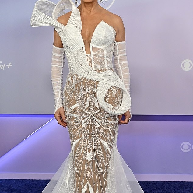 Paula Abdul hit the carpet in a bold white gown which contained a huge piece of fabric that wrapped around her shoulder and waist. Between that and the puffy skirt, we weren't a fan of the look - Daily Mail US