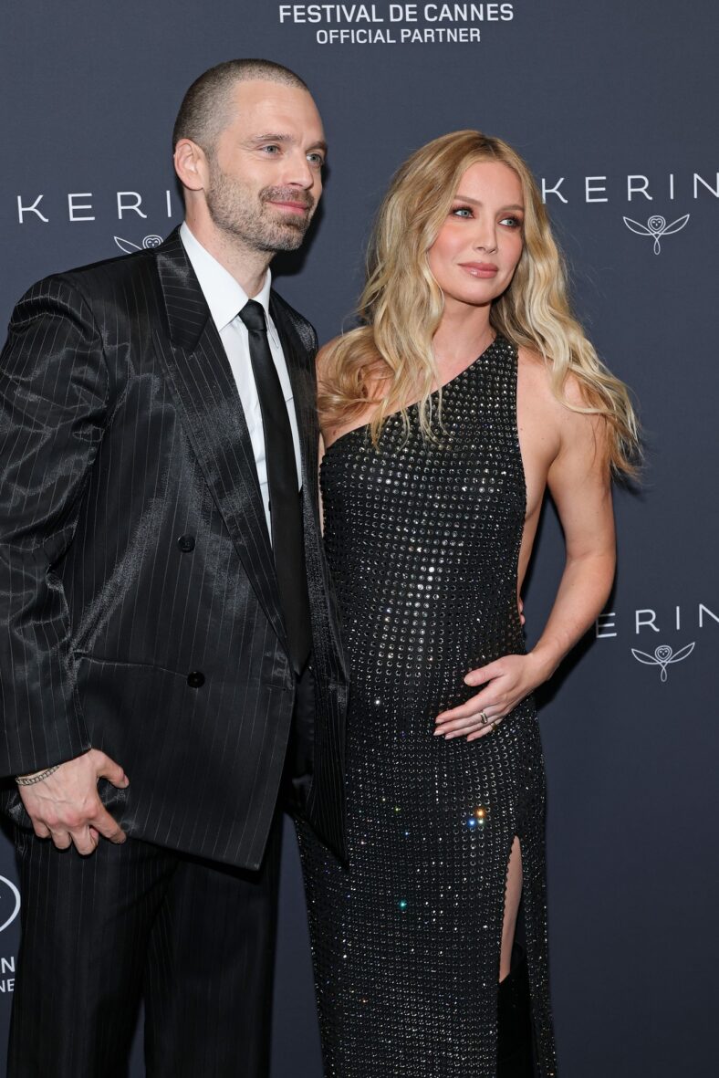 Sebastian Stan and Annabelle Wallis at a Cannes photo call, with Wallis cradling her bump