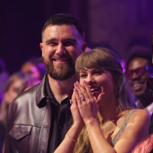 The athlete (pictured above on March 26) "can't wait" to marry the Grammy winner. - Kevin Mazur/Getty Images for iHeartRadio