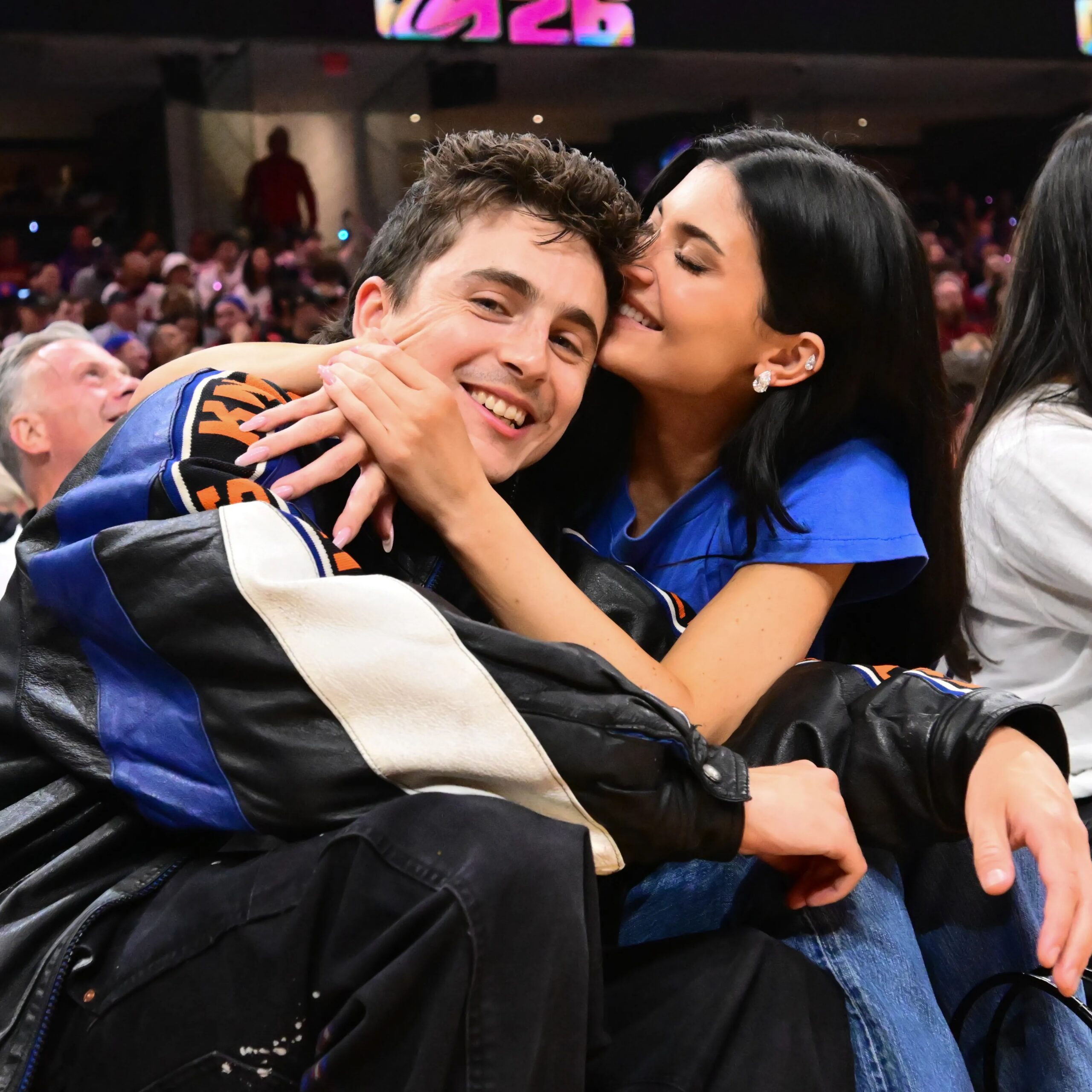 The pair packed on the PDA from their upgraded courtside seats. - Ken Blaze-Imagn Images