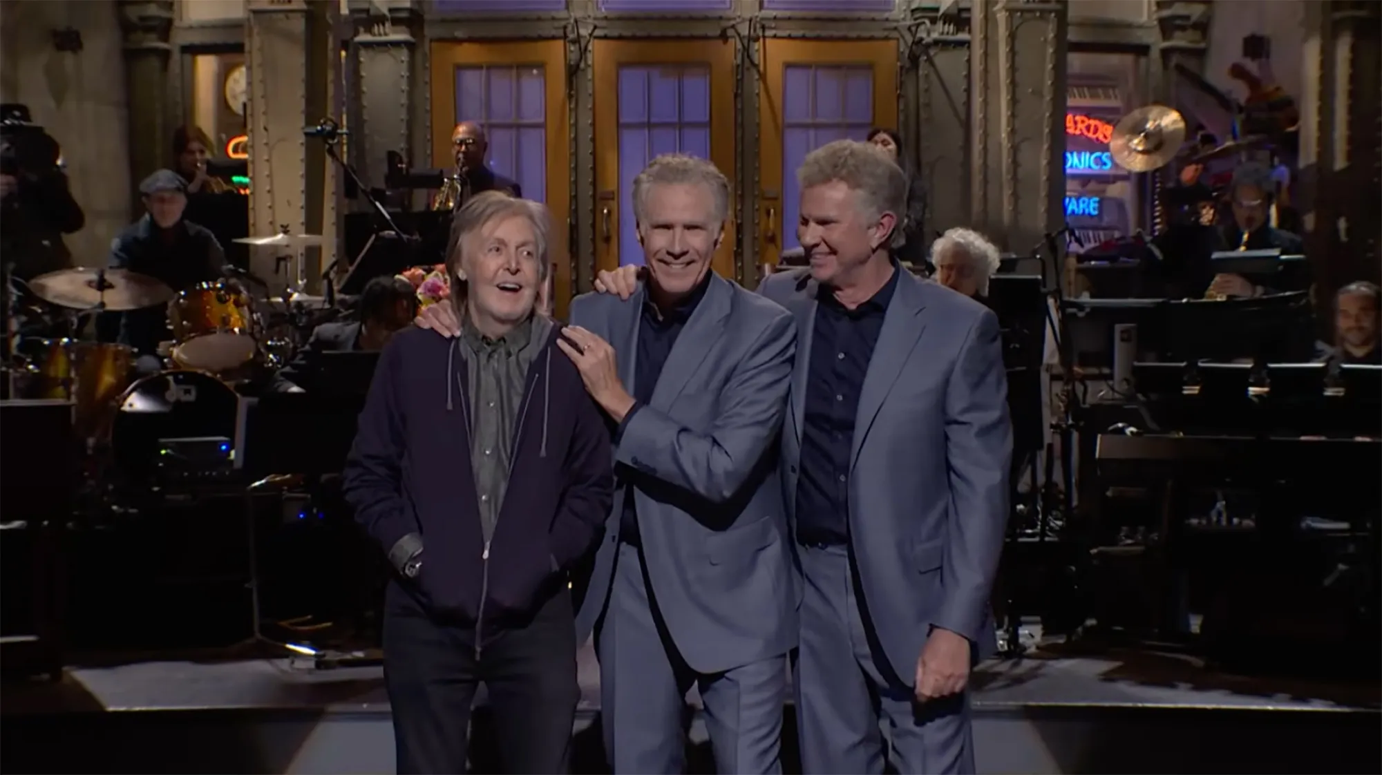 Paul McCartney with host Will Ferrell and drummer Chad Smith in the SNL cold open.