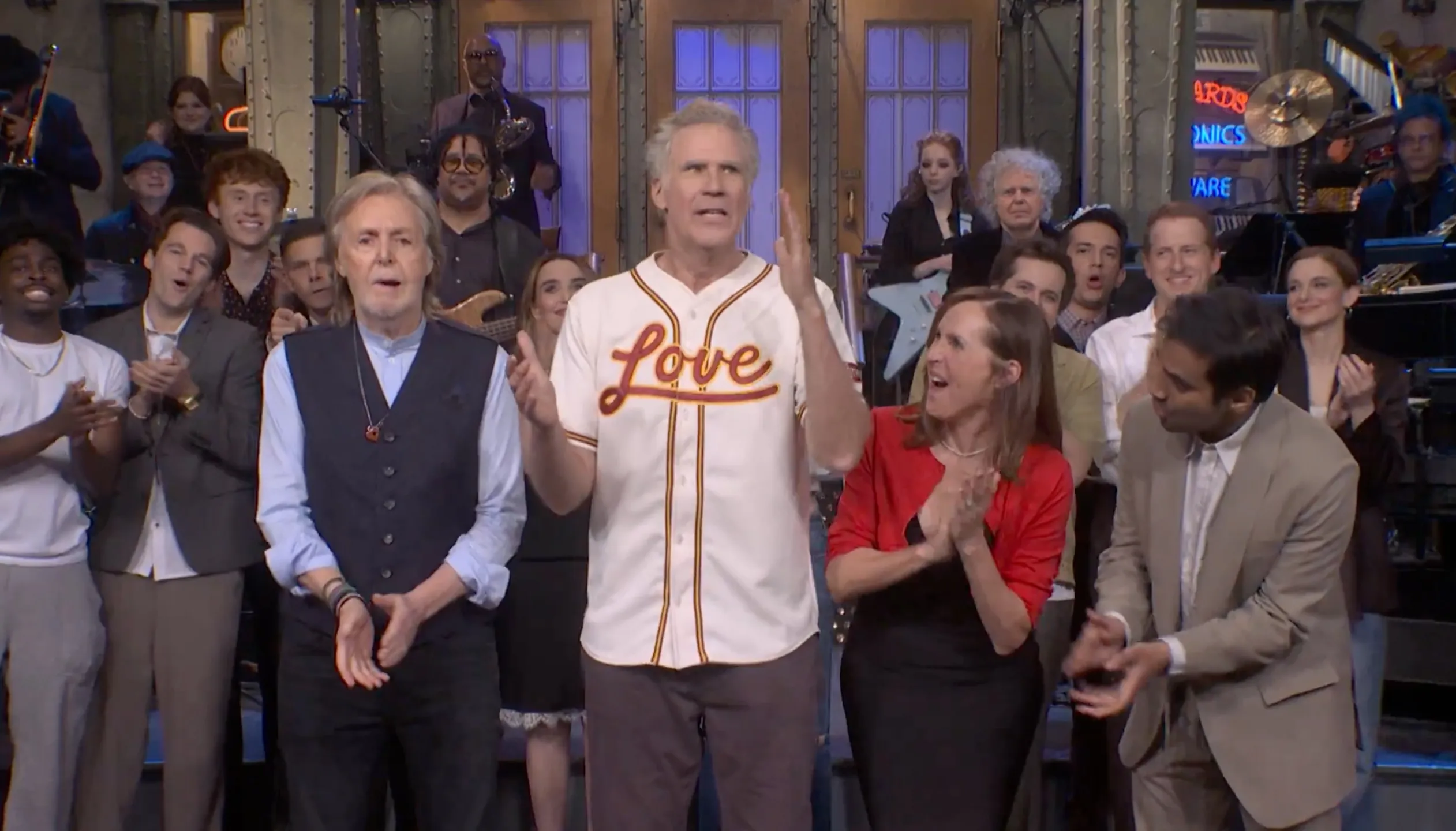 Paul McCartney and Will Ferrell join the SNL cast during the goodnights of the Season 51 finale.