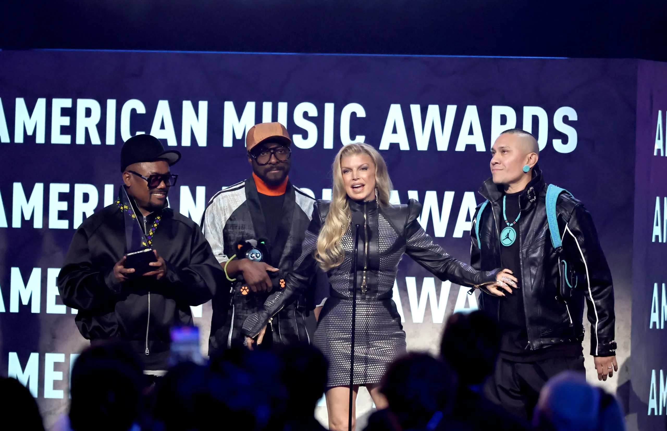 Members of Black Eyed Peas, apl.de., will.i.am, Fergie and Taboo, accept the Best Throwback Song award.