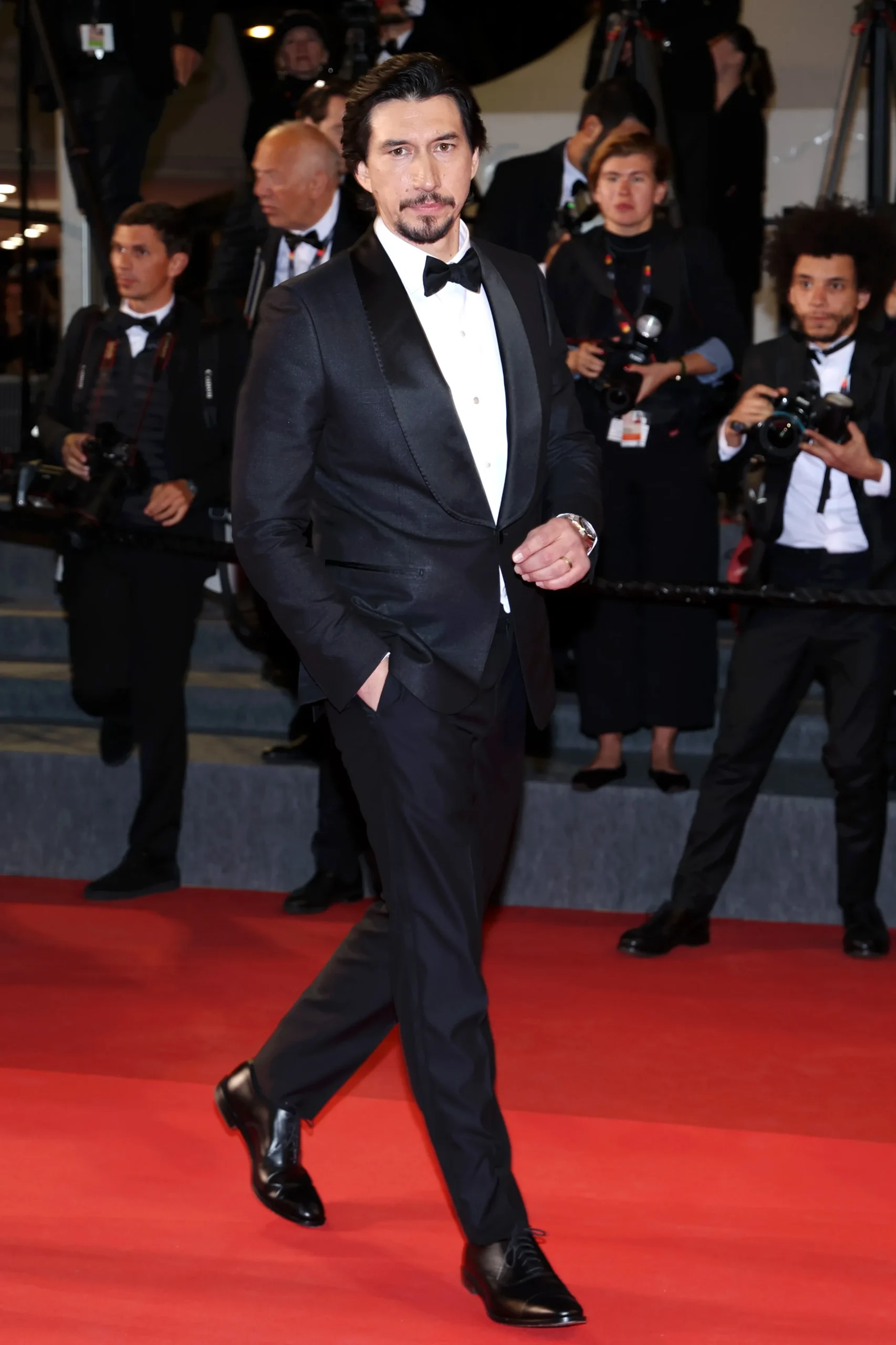 Adam Driver on the red carpet at the Cannes Film Festival for Paper Tiger.