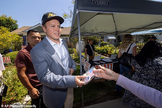 Spencer Pratt speaking at an outdoor event