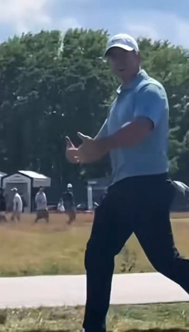 Rory McIlroy reacts to a spectator during the U.S. Open at Shinnecock Hills; social clips alleged he gestured toward a heckler.