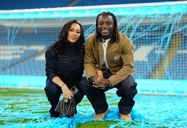 Jeremy Doku with his partner Shireen.