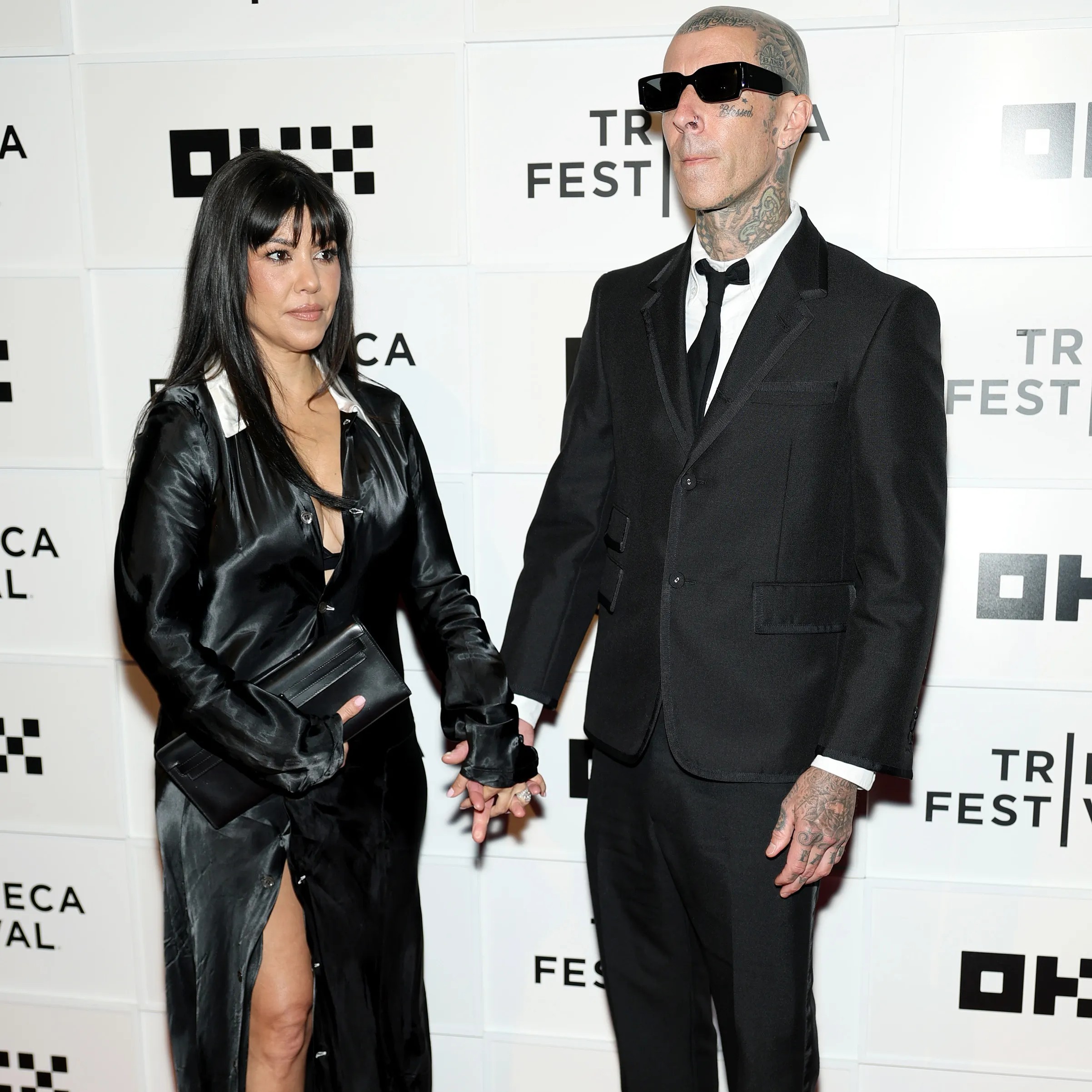 Kourtney Kardashian and Travis Barker made a rare red carpet appearance at the Tribeca Film Festival on Saturday night. - Getty Images for Tribeca Festival