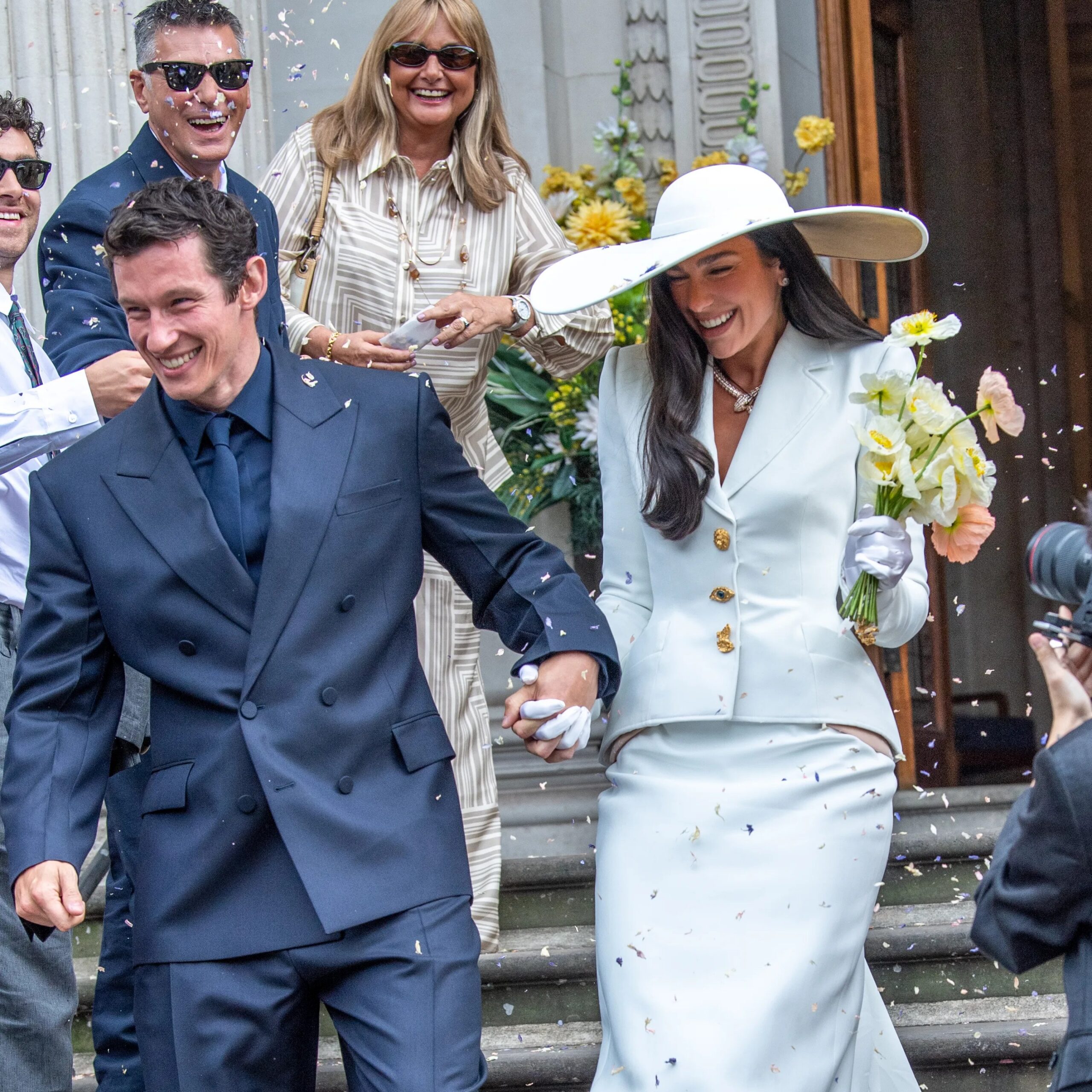 Dua Lipa and Callum Turner left Old Marylebone Town Hall in London as newlyweds on Sunday. The Sun / News Licensing - Page Six