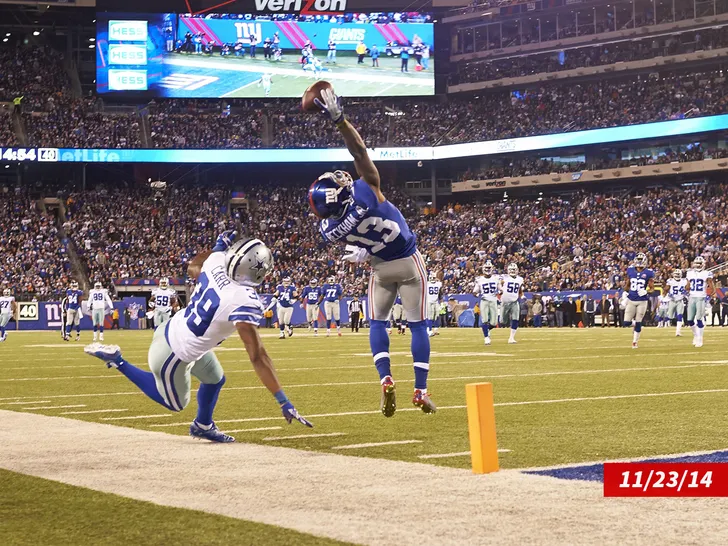Odell Beckham Jr. makes his iconic one-handed 'The Catch' for the New York Giants in 2014.